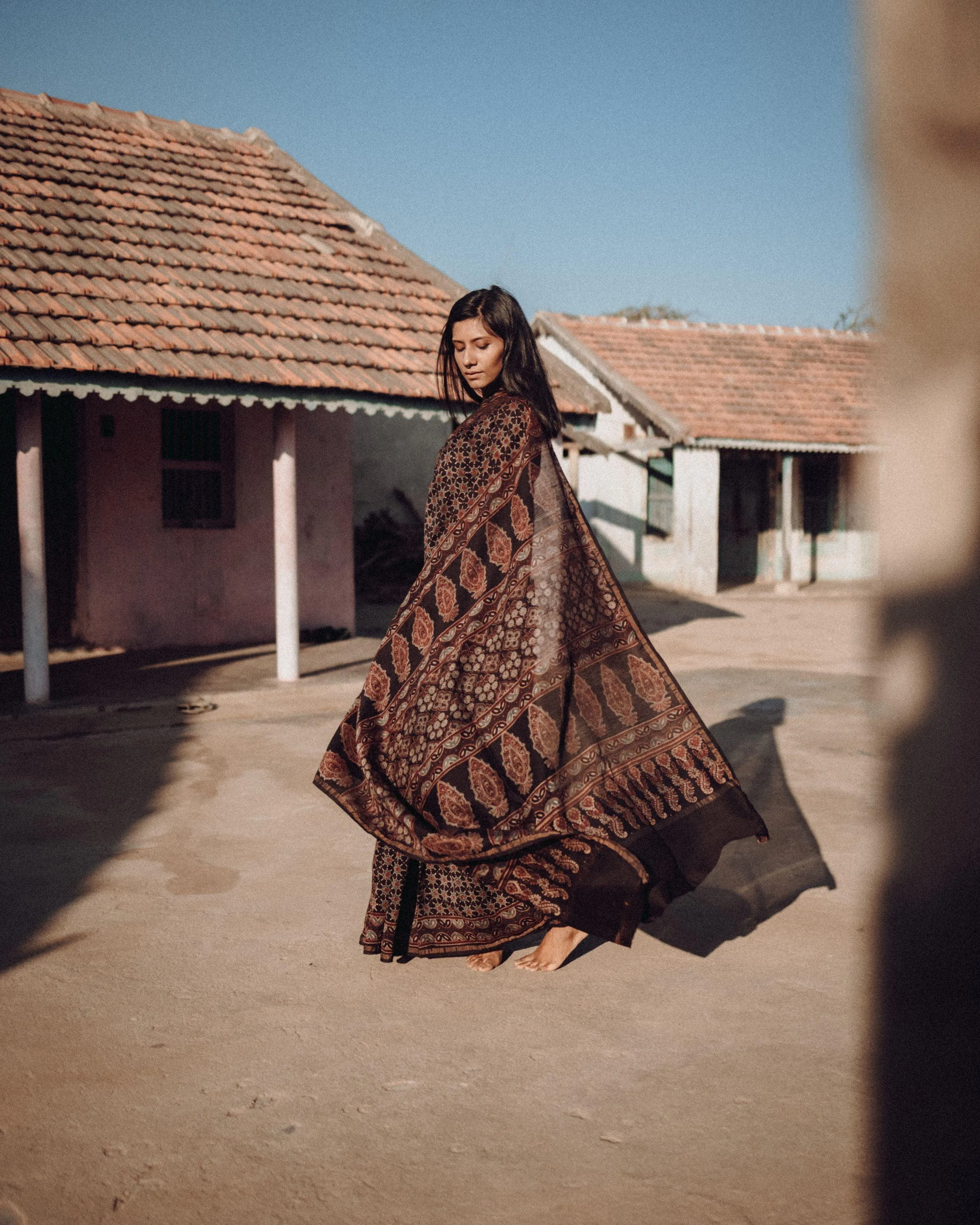 Jharokha -Black silk cotton Ajrakh handblockprinted saree