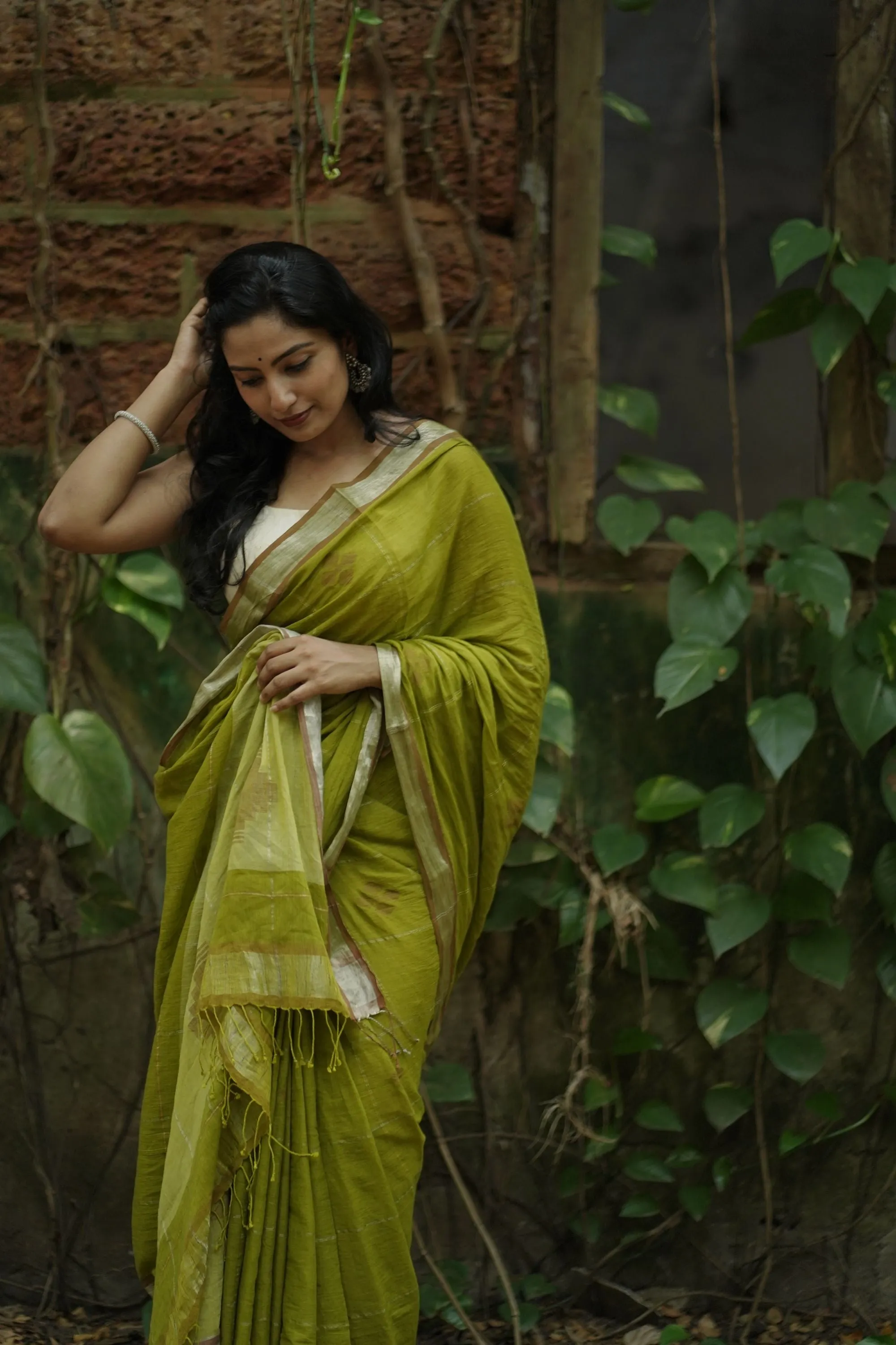 Sitara -light green zari by cotton saree